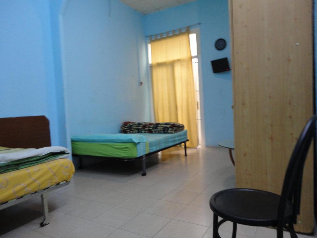 Dreibettzimmer mit Gemeinschaftsbad
